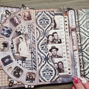 May include: A vintage-style scrapbook with a rotating viewer featuring small, square images. The scrapbook has pages with patterned designs and film strip-style photo holders. The cover is decorated with a damask pattern and the words "A Fading Memory".