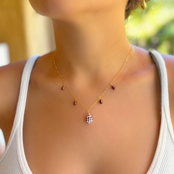 Hebrew shell with chocolate brown pearls on a gold filled necklace