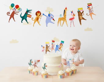 Set de decoración para fiestas de cumpleaños con temática de animales de circo, que incluye banderines para pasteles y adornos para cupcakes.