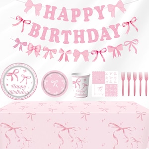 May include: A pink birthday party set featuring a banner reading "Happy Birthday". The set includes plates, cups, forks, and a tablecloth, all decorated with bows. The banner and tableware are in shades of pink.