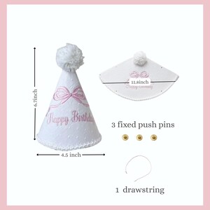 May include: White birthday party hat with pink embroidered bow and text "Happy Birthday". The hat is 6.7 inches tall and 4.5 inches wide, with a white pom-pom on top. Includes 3 fixed push pins and a drawstring.
