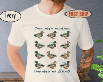 Community Is Resistance Shirt, Unity Duck Graphic Tee, Activism with Hidden Message Top, Equality Activist Gift, Anti ICE Protest Apparel