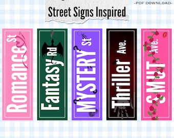 May include: Digital bookmarks with street sign designs. The bookmarks feature the words "Romance St", "Fantasy Rd", "Mystery St", "Thriller Ave", and "Smut Ave" in white text on various colored backgrounds.