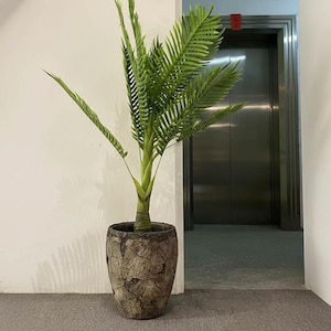 May include: A rustic wooden sign with the text "Welcome to our home" in a handwritten style. The sign features a distressed finish and a simple, inviting design, perfect for entryway decor.