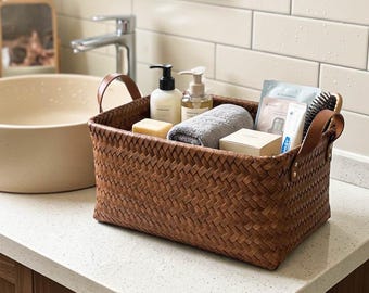 Cesta de almacenamiento de plástico tejido con asas, organizador rústico.