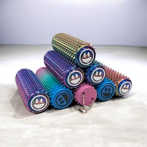 May include: A collection of colorful, textured handlebar grips. The grips feature a rainbow of colors, including blue, purple, and gold. Each grip has a smiley face design on the end. A pink grip with a chain is also included.