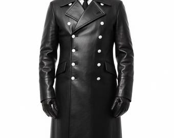 May include: A black leather coat with a double-breasted design. The coat features white buttons, a notched collar, and long sleeves. The person in the image is also wearing black gloves and a black tie.