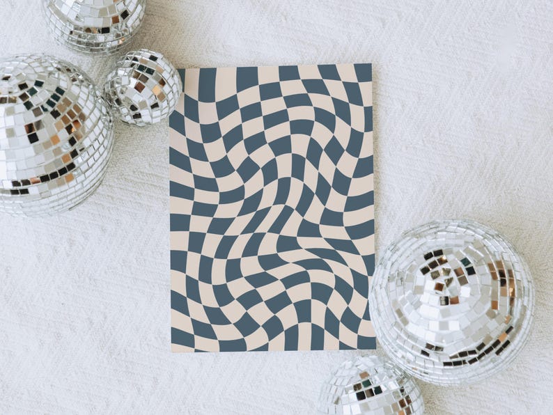 May include: A decorative print featuring a distorted checkerboard pattern in shades of blue and beige. The print is rectangular and surrounded by several mirrored disco balls, creating a retro aesthetic.