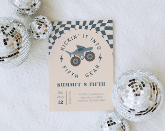 May include: A party invitation with a shark on monster truck wheels, the text "KICKIN' IT INTO FIFTH GEAR" and "SUMMIT'S FIFTH". The invitation is beige with a checkered pattern and lightning bolts. Silver disco balls surround the invitation.