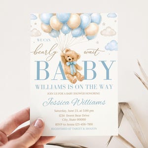 May include: A white ceramic mug with a black handle and the text "But First, Coffee" in a black, handwritten-style font. The mug is on a white surface.