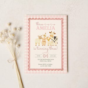 May include: A pink gingham-framed invitation with the text "three-i-e-i-o AMELIA is turning three!" and a farm animal illustration. The invitation includes the date, time, and location of the event.