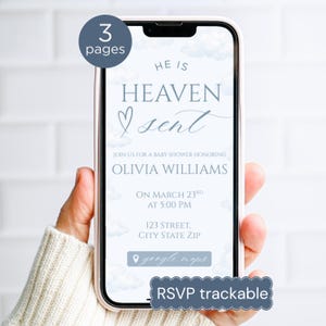 Puede incluir: Un teléfono inteligente muestra una invitación a un baby shower con el texto "He is Heaven Sent". La invitación incluye detalles para el baby shower de Olivia Williams, como la fecha, la hora y el lugar. El diseño presenta nubes y un corazón, con una etiqueta "RSVP trackable".