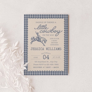 May include: Baby shower invitation with a cowboy theme. The invitation features a blue and tan color scheme with the text "Saddle up there's a little cowboy on the way." The invitation includes the name Jessica Williams, the date, and RSVP information.