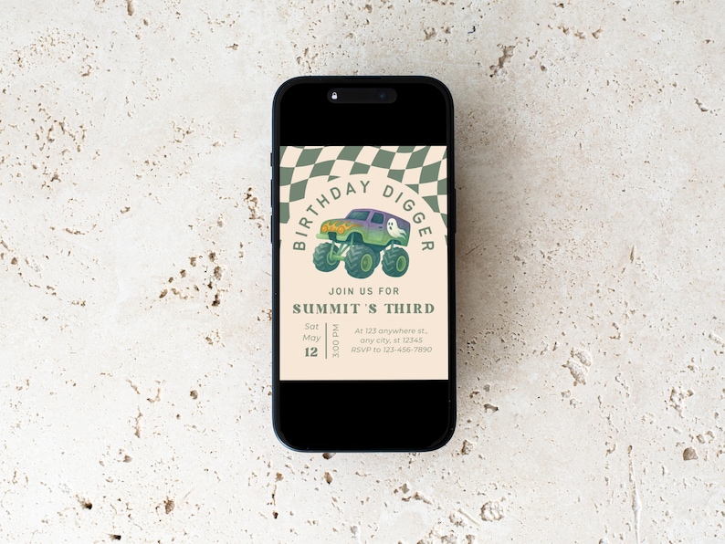 May include: A smartphone displays a birthday invitation. The invitation features a monster truck graphic with the text "BIRTHDAY DIGGER" and "SUMMIT'S THIRD". The date and time are also included. The background is a beige color with a checkered pattern.