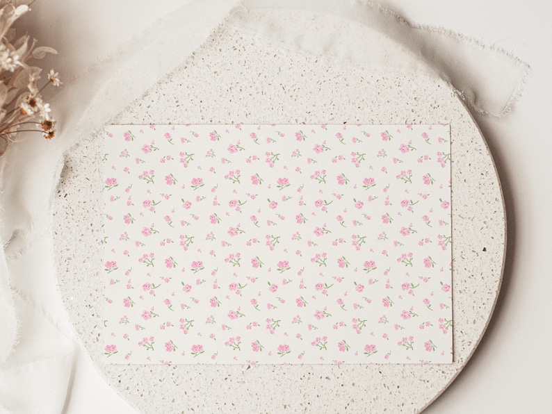 Coordinating back design for preppy floral 11th birthday invitation and thank-you card bundle, featuring matching pastel florals and gingham pattern. Editable Canva templates designed as a cohesive preppy birthday set for girls.