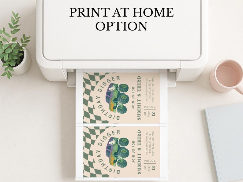 May include: A printer is shown printing two invitations. The invitations feature a green monster truck graphic with the text "Birthday Digger" and "Summit's Third". The text "Print at Home Option" is above the printer.