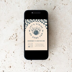 May include: A black smartphone displays a bowling-themed invitation. The design features a bowling ball and pins, with text that reads "Let's Strike Up Some Fun." The invitation includes event details: Summit's Seventh, May 12, 3:00 PM, and an address.