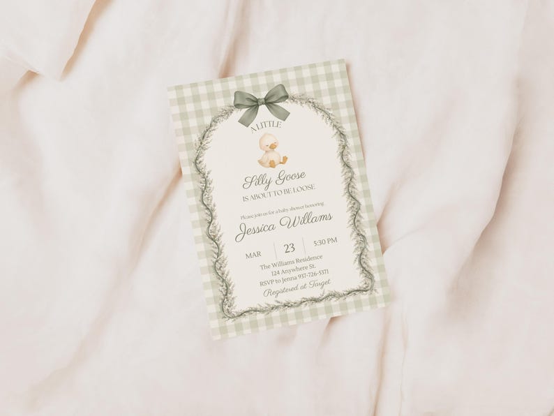 May include: A baby shower invitation with a light green gingham border and a decorative floral frame. The invitation features the text "A Little Silly Goose is About to be Loose" and event details.