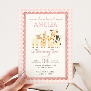 May include: A pink gingham-framed invitation with the text "oink, cluck, baa & moo AMELIA is turning two!" features illustrations of farm animals. The invitation includes event details: date, time, and location.