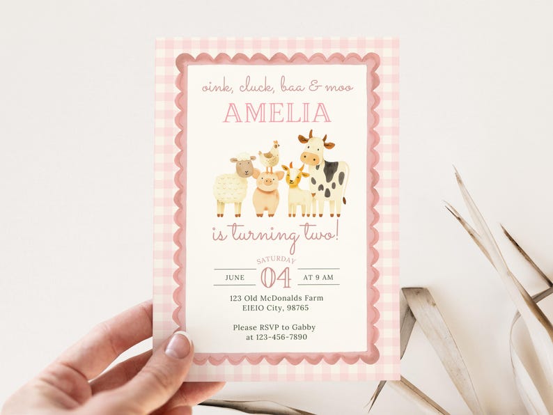 May include: A pink gingham-framed invitation with the text "oink, cluck, baa & moo AMELIA is turning two!" features illustrations of farm animals. The invitation includes event details: date, time, and location.