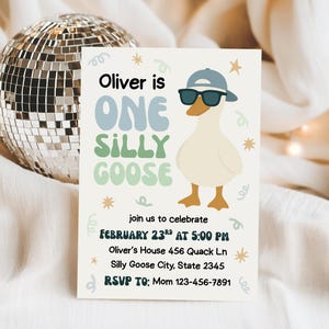 May include: A party invitation with the text "Oliver is ONE SILLY GOOSE" and a cartoon goose wearing sunglasses and a hat. The invitation includes the date, time, and location of the party. A disco ball is in the background.