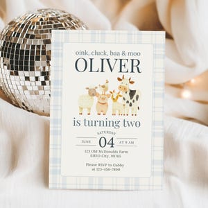 May include: A light blue and white plaid invitation with the text "oink, cluck, baa & moo OLIVER is turning two". The invitation features illustrations of farm animals. A disco ball is in the background.