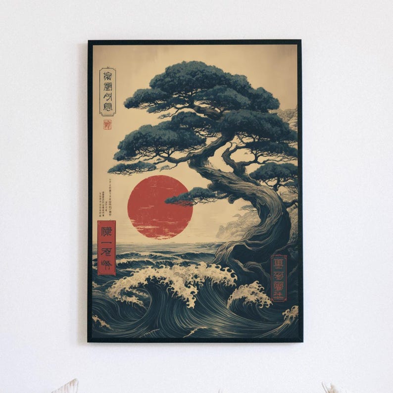May include: A framed art print with a Japanese landscape design. The image shows a bonsai tree, a red sun, and ocean waves. Japanese text is visible in the upper left and lower right corners. The artwork is framed in black.