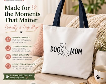 May include: A white canvas tote bag with dark blue handles featuring a black line art graphic of a dog and the text DOG MOM. The bag is displayed alongside promotional text including FurAway, Made for the Moments That Matter, and Proudly a Dog Mom.