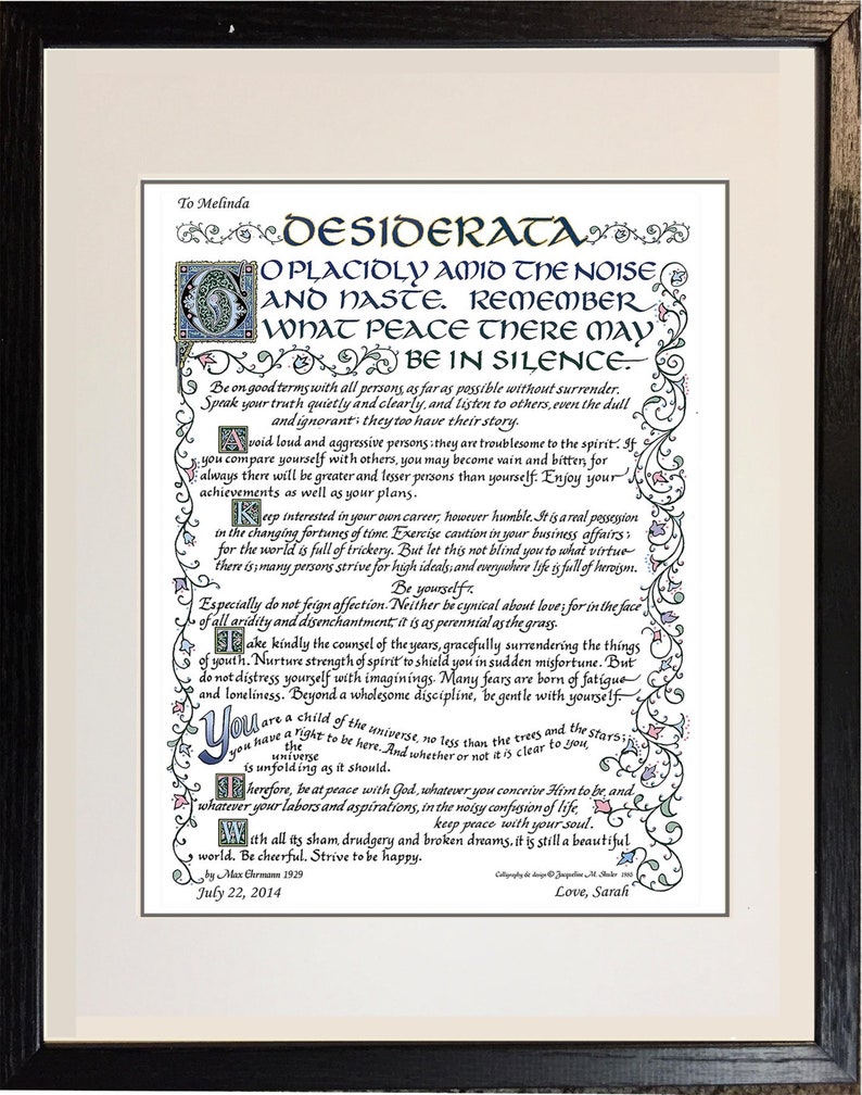 May include: Framed print of the poem "Desiderata" with ornate calligraphy and floral embellishments. The text is in black ink on a cream-colored background, framed in a black wooden frame. The date "July 22, 2014" is visible.
