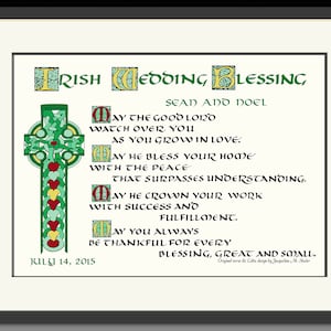 May include: Framed Irish Wedding Blessing art print with a Celtic cross design in green, red, and yellow. The text includes a blessing for Sean and Noel, dated July 14, 2015. The artwork is in a black frame.