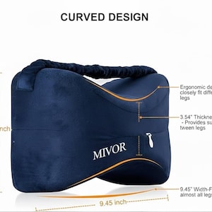 May include: A navy blue knee pillow with a curved design, branded "MIVOR". It measures 16.5 cm in height, 9 cm in thickness, and 24 cm in width. The pillow is designed to support the legs, with an ergonomic design.