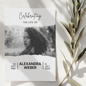 May include: A memorial card featuring a monochrome photograph of a woman with curly hair. The text reads "Celebrating the Life of" above the image. The name "Alexandra Weber" and dates are below.