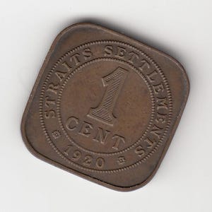 May include: A square, bronze coin from the Straits Settlements, with the number "1" at the centre. The coin is inscribed with "STRAITS SETTLEMENTS" around the edge and "1 CENT 1920" below the number. The coin is a historical item.