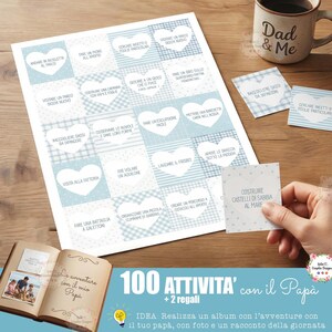 Può includere: Un set di carte attività con cuori blu e testo in italiano, tra cui frasi come "Visita un nuovo parco" e "Costruisci castelli di sabbia in spiaggia". Le carte fanno parte di un set intitolato "100 Attività con Papà".