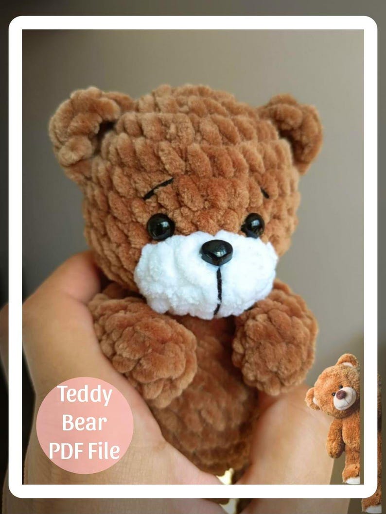 May include: A handmade brown teddy bear with a white muzzle and black eyes. The bear is made of a soft, textured material and is being held in someone's hands. The image includes the text "Teddy Bear PDF File" in a pink circle.
