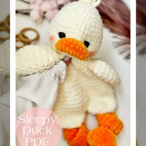 May include: A handmade crochet duck doll in cream and orange. The duck has a white head with a tuft, black eyes, and an orange beak and feet. The text "Sleepy Duck PDF" is on the image.