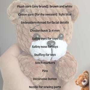 May include: A handmade brown and white plush teddy bear with a light blue sweater. The image includes a list of materials and tools needed to make the bear, including yarn, a crochet hook, safety eyes, and a decorative button.