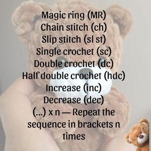 May include: A crochet teddy bear with a list of crochet abbreviations. The text includes "Magic ring (MR), Chain stitch (ch), Slip stitch (sl st), Single crochet (sc), Double crochet (dc), Half double crochet (hdc), Increase (inc), Decrease (dec)."