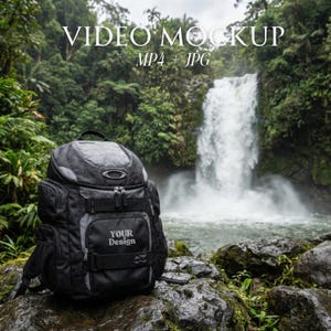May include: Black and gray backpack with the text "YOUR DESIGN" on the front, set against a backdrop of a waterfall and lush green foliage. The words "VIDEO MOCKUP" and "MP4 + JPG" are at the top.