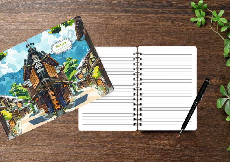 May include: A spiral-bound notebook with a white interior featuring horizontal lines. The cover displays a colorful illustration of a traditional street scene with wooden buildings, green trees, and a blue sky. The word Notebook is printed on the cover.
