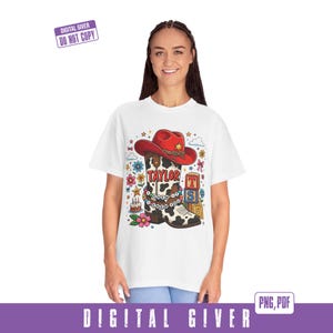May include: A white t-shirt featuring a graphic of a cow-print cowboy boot with a red hat, a beaded bracelet with the text I KNEW IT I KNEW YOU, a birthday cake, flowers, and blocks with the letters T, S, and the number 5, with the name TAYLOR.