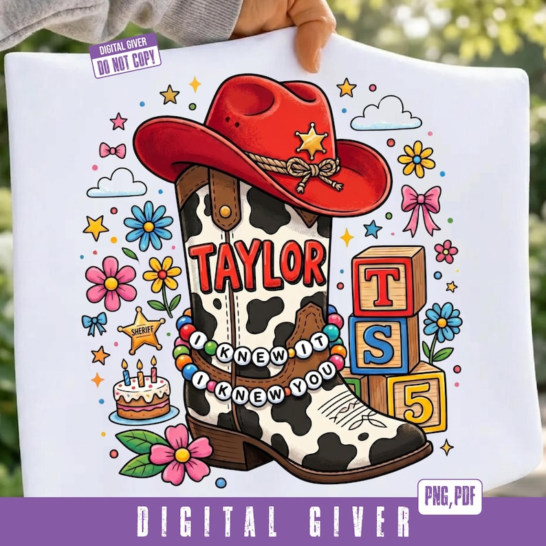 May include: A white graphic print featuring a red cowboy hat atop a cow-print boot. The boot displays the name TAYLOR, a beaded bracelet reading I KNEW IT I KNEW YOU, and is surrounded by colorful flowers, a sheriff star, a cake, and blocks.