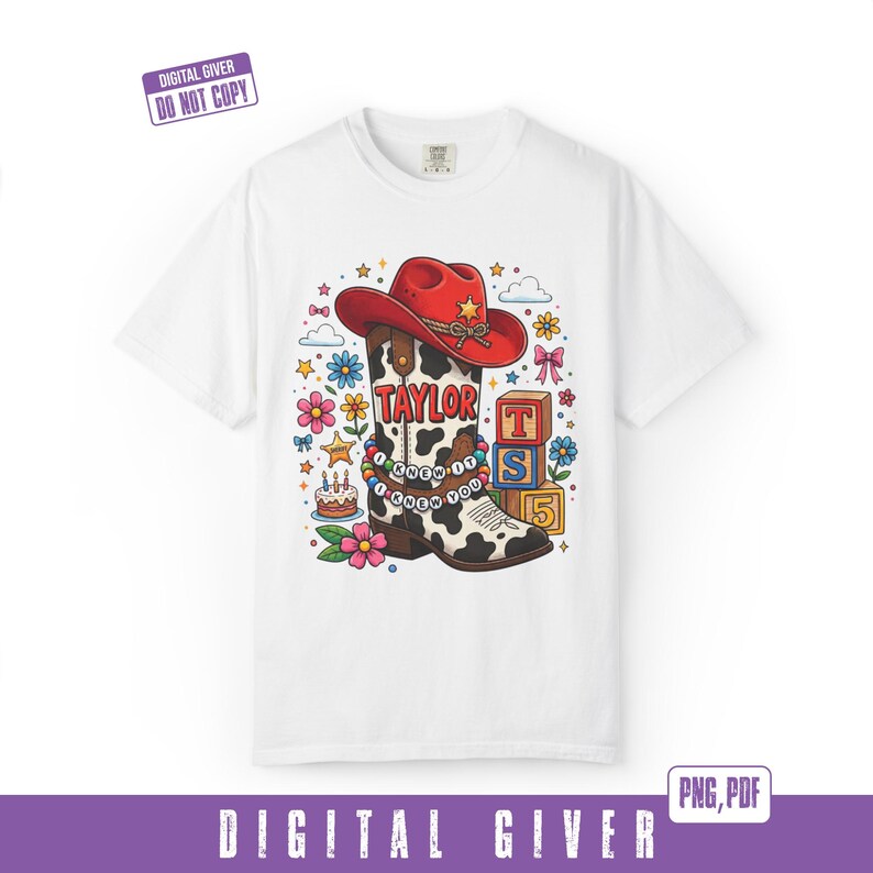 May include: A white t-shirt featuring a graphic of a red cowboy hat atop a cow-print cowboy boot. The boot displays the text TAYLOR and a beaded bracelet reading I KNEW IT I KNEW YOU. Surrounding elements include colorful flowers, stars, a cake, and blocks with the letters T, S, and the number 5.