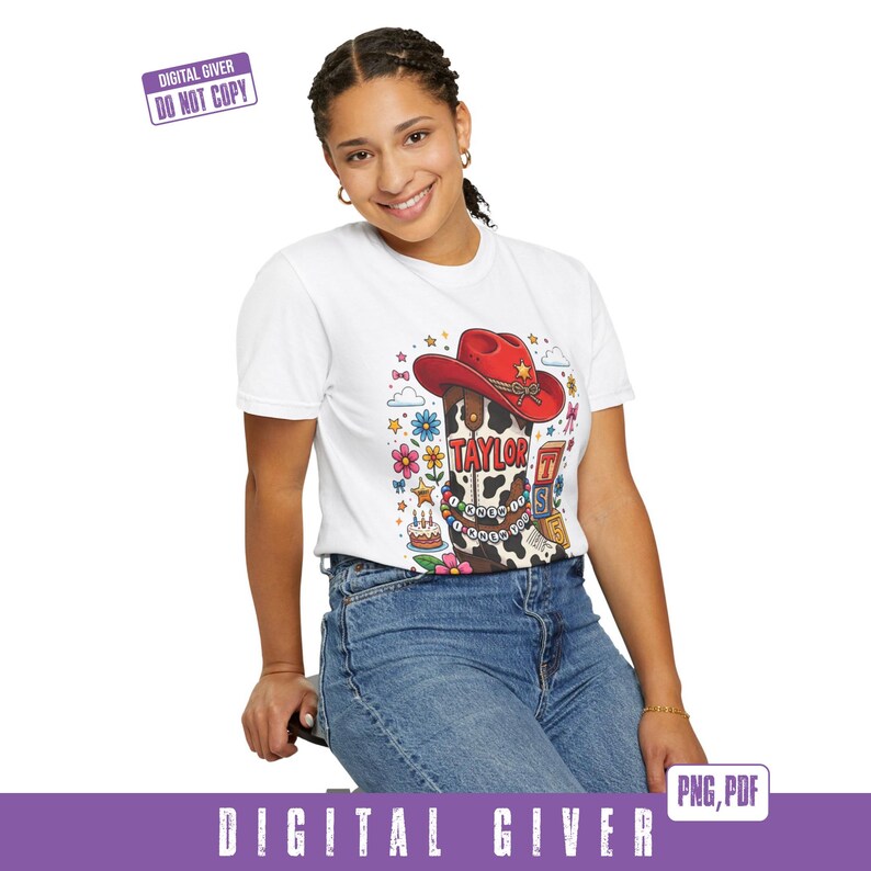 May include: A white t-shirt featuring a graphic of a cow-print cowboy boot topped with a red cowboy hat. The boot displays the name Taylor, a beaded bracelet reading I KNEW IT, and is surrounded by colorful flowers, stars, and a birthday cake.