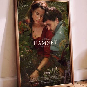 May include: A rustic wooden sign with the text "Welcome to our home" in white lettering. The sign features a distressed finish and a simple, inviting design, perfect for front door decor.