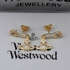 Pendientes Vivienne Westwood en caja, pendientes Saturno con circonita cúbica y broche dorado, regalos para ella