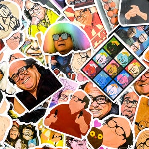 May include: A selection of vibrant stickers showcasing images of a man wearing glasses. The stickers depict the man in diverse poses and outfits, with some smiling. The stickers vary in size and shape, creating a visually engaging assortment.