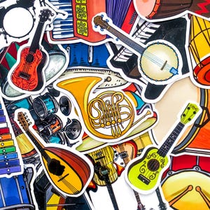 May include: A collection of colorful stickers featuring various musical instruments. The stickers include a red guitar, a banjo, a yellow French horn, a mandolin, a green ukulele, drums, and an accordion. The stickers are on a white background.