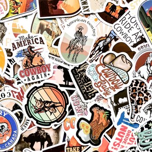 May include: A collection of colorful cowboy-themed stickers. Designs include cowboys on horses, cowboy hats, and phrases like "Cowboy Baby" and "Make America Cowboy Again." The stickers feature a variety of colors and styles.