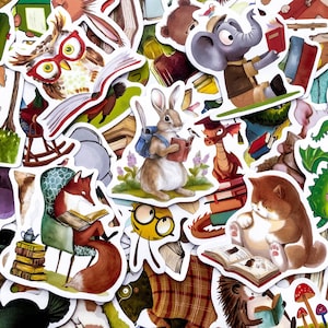 May include: A selection of colourful stickers depicting animals engrossed in reading. The stickers showcase an owl, a fox, a rabbit with a backpack, and a cat, all with books. Ideal for personalising notebooks, laptops, or other belongings.